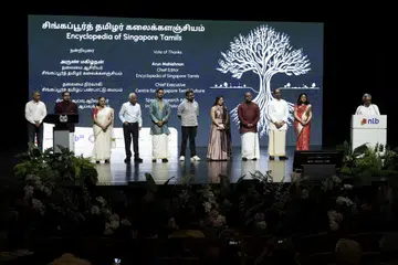 Mr Arun Mahizhnan (far right) thanking volunteers and staff who worked on the Encyclopedia of Singapore Tamils. From left: Mr Raja Mohamed, Mr Nithish Senthur, Dr Kalpana Balasubramaniam, Mr Subbiah Nadarajan, Mr Sembian Somasundaram, Mr Ramchander Krishna, Ms Abigail Huang, Mr Azhagiya Pandiyan, Mr Sivanantham Neelakandan, and Ms Zainab Osman.