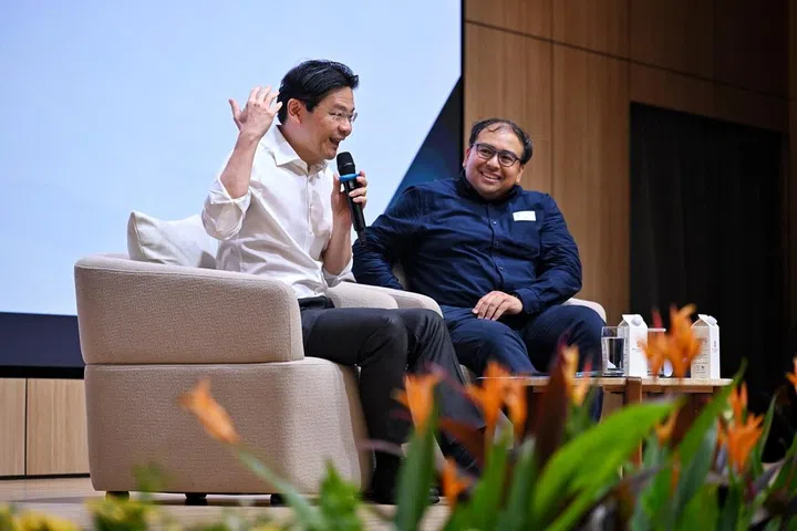 Prime Minister Lawrence Wong and The Straits Times’ associate editor Zakir Hussain at a dialogue with the Singapore Press Club in Toa Payoh on June 8.