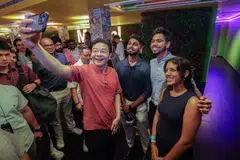 Prime Minister Lawrence Wong with Indian youth group leaders after a dialogue organised by Tamil Murasu.