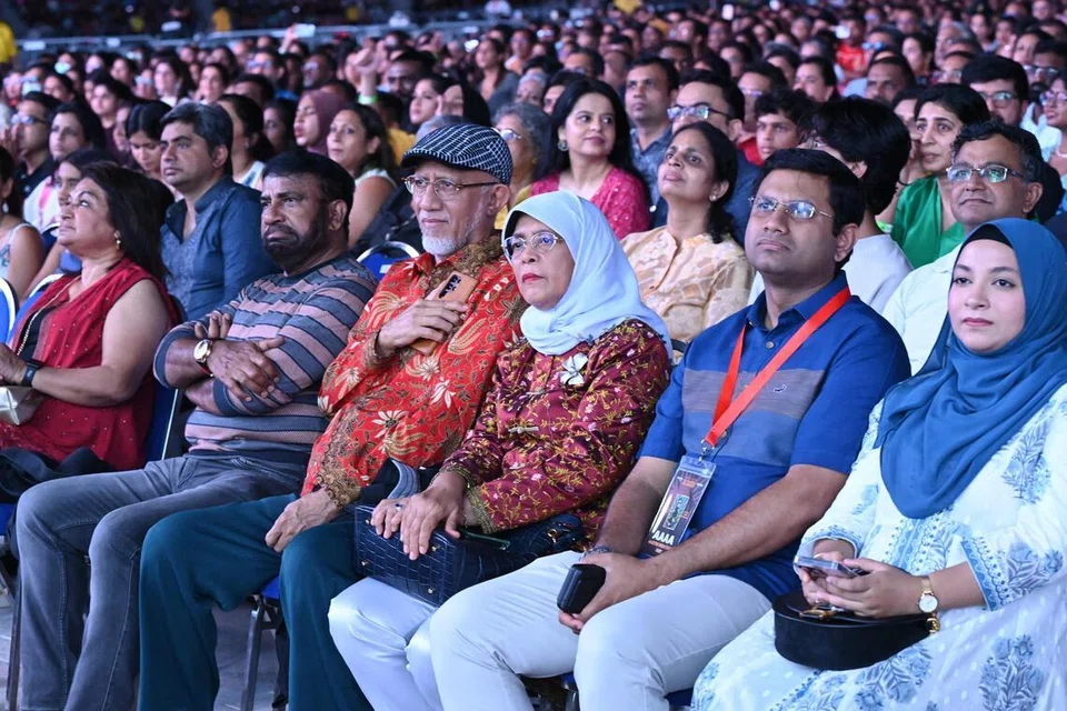 Ex-President Halimah Yacob and her husband Mohammed Abdullah Alhabshee were among the audience of 25,000 at the National Stadium on Aug 31.