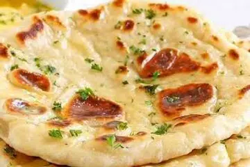 Two-ingredient naans made with silken tofu and self-raising flour.