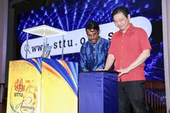 Prime Minister Lawrence Wong and Singapore Tamil Teachers' Union president Danapal Kumar launching Sanctuary of Power, which chronicles the organisation's 75-year journey.