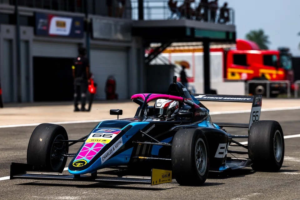 Kareen Kaur in the paddock at the Formula Trophy Malaysia with Evans GP at the Sepang International Circuit in Kuala Lumpur.