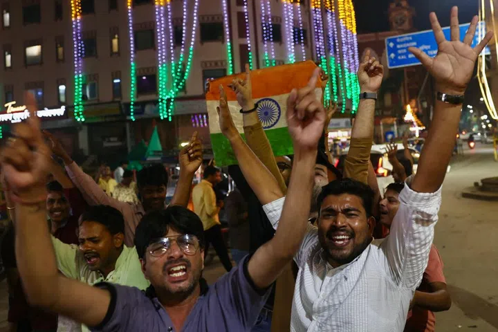 Fans in Varanasi celebrating India’s World Cup win. 