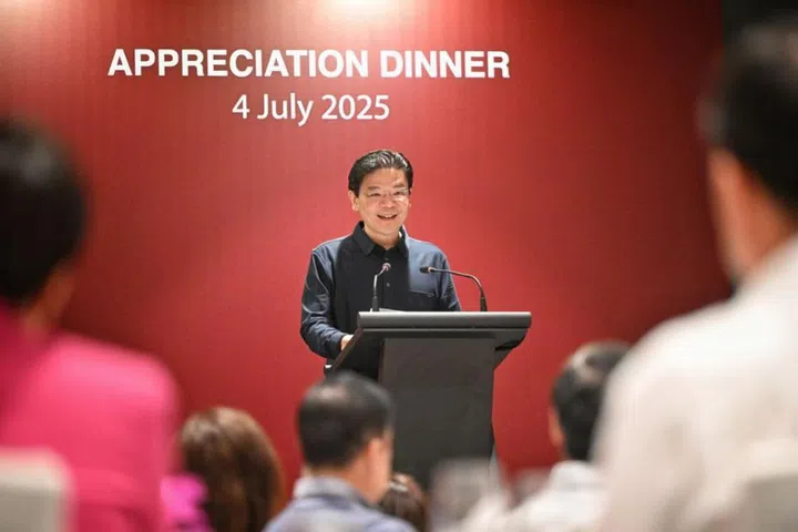 Prime Minister Lawrence Wong speaking at an appreciation dinner for 20 retired MPs at Parliament House on July 4.