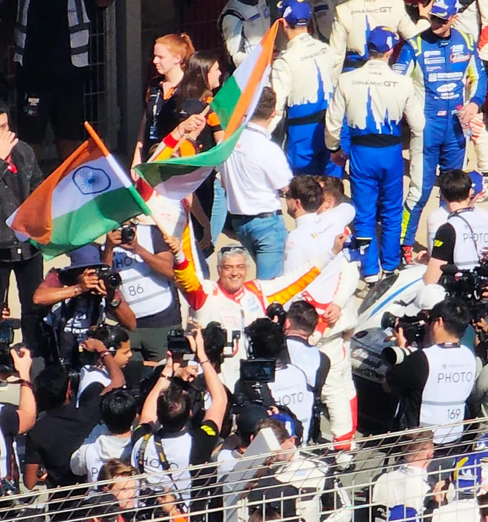 Ajith Kumar celebrating in Dubai after his team finished third in the 24H Dubai 2025 endurance race.