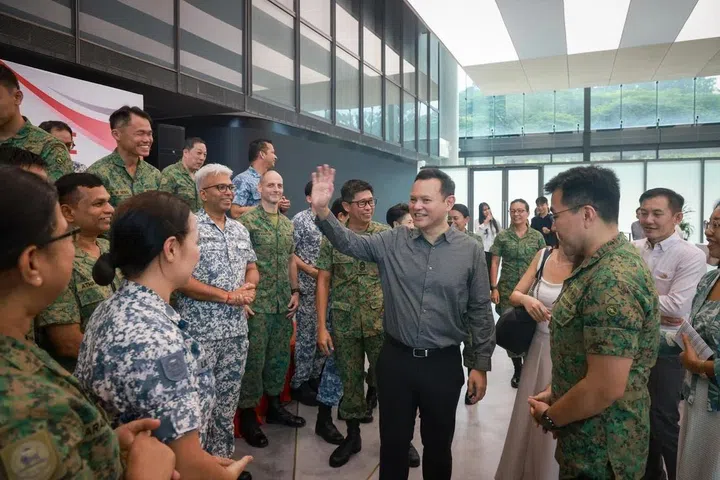 Senior Minister of State for Defence Zaqy Mohamad meeting SAF volunteers and regulars during the launch of the Singapore Defence Volunteer Network at the Central Manpower Base on May 12.