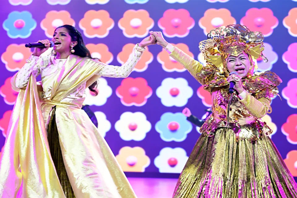 Sushma Soma (left) and Asnida Daud performing Song for Singapore as part of Chapter 3 of the NDP 2026 Show. 
