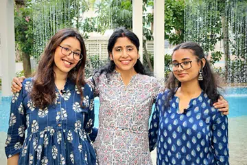 Ugna Natya Mandali Singapore founder-president Aradhana Jha Shrivastava (centre) with young artistes Riddhima Mishra (left) and Wagisha Vani. 