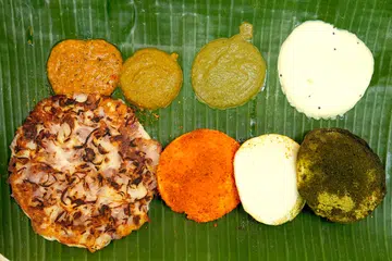 Murugan Idli Shop’s onion uttappam, podi idlis and chutneys.