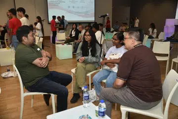 Mentors and mentees having a discussion during the launch of the Tata-PA Youth Career Exploration & Mentorship Programme.
