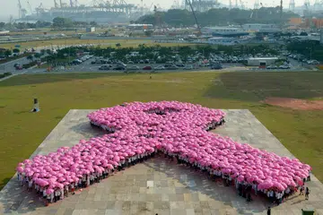 More than 2,300 people, armed with pink umbrellas, formed a giant pink ribbon to show their support for breast cancer awareness at the Waterfront Promenade in Marina Bay. The formation made it into the Singapore Book of Records for being the largest pink ribbon formation in Singapore. The event marked the 10th anniversary of Breast Screening Programme by the Health Promotion Board.