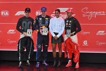 (L-R): Charles Leclerc, Max Verstappen, Shanti Pereira and Lewis Hamilton
