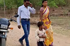 Ms Shanti Bai Marawi, an independent candidate from Bhedrapani village, Korba Lok Sabha seat, with her husband and child.