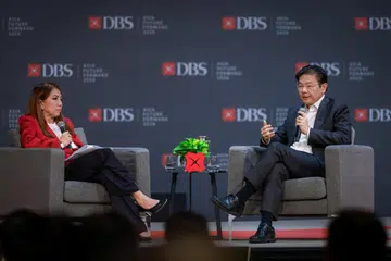 Prime Minister Lawrence Wong participates in a dialogue moderated by DBS Bank CEO Tan Su Shan during the DBS Asia Future Forward Conference at Suntec Convention and Exhibition Centre on Oct 12, 2026.
