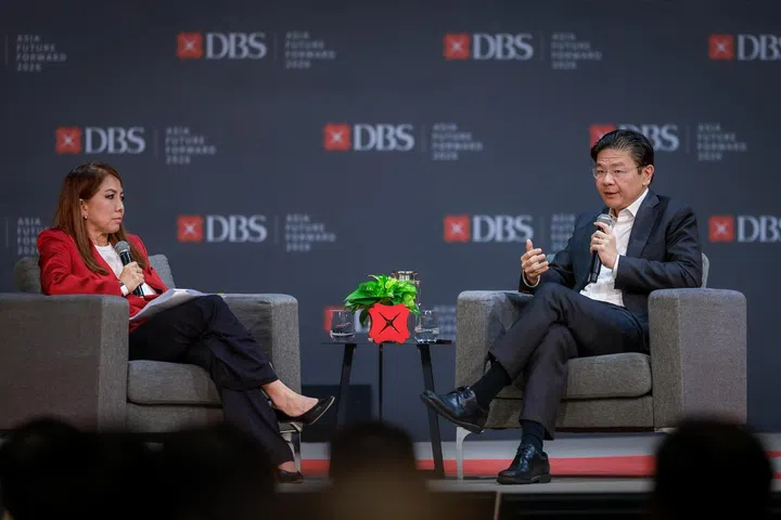 Prime Minister Lawrence Wong participates in a dialogue moderated by DBS Bank CEO Tan Su Shan during the DBS Asia Future Forward Conference at Suntec Convention and Exhibition Centre on Oct 12, 2026.