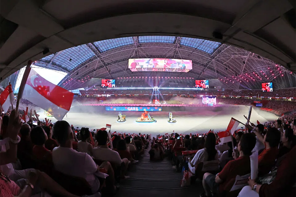 The People’s Parade - which features 18 thematically designed floats in a procession dedicated to celebrating everyday Singaporeans who go above and beyond to enrich the lives of others and make our nation a better home - during Chapter 2 of National Day Parade Preview 2 at the National Stadium on Aug 1, 2026.