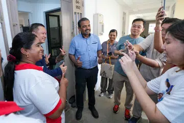 The large-scale effort, held on May 24, saw nearly 500 volunteers spread across 15 constituencies distribute grocery items sponsored by the FairPrice Group while engaging residents in conversations about their needs and challenges.