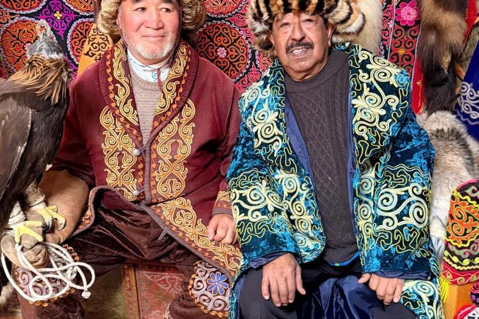 All dressed up -- Anil Sachdeva (right) and a Mongolian guide.