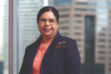 Sister Grace Krishnan received the Model Worker Award at the NTUC May Day Awards 2026.