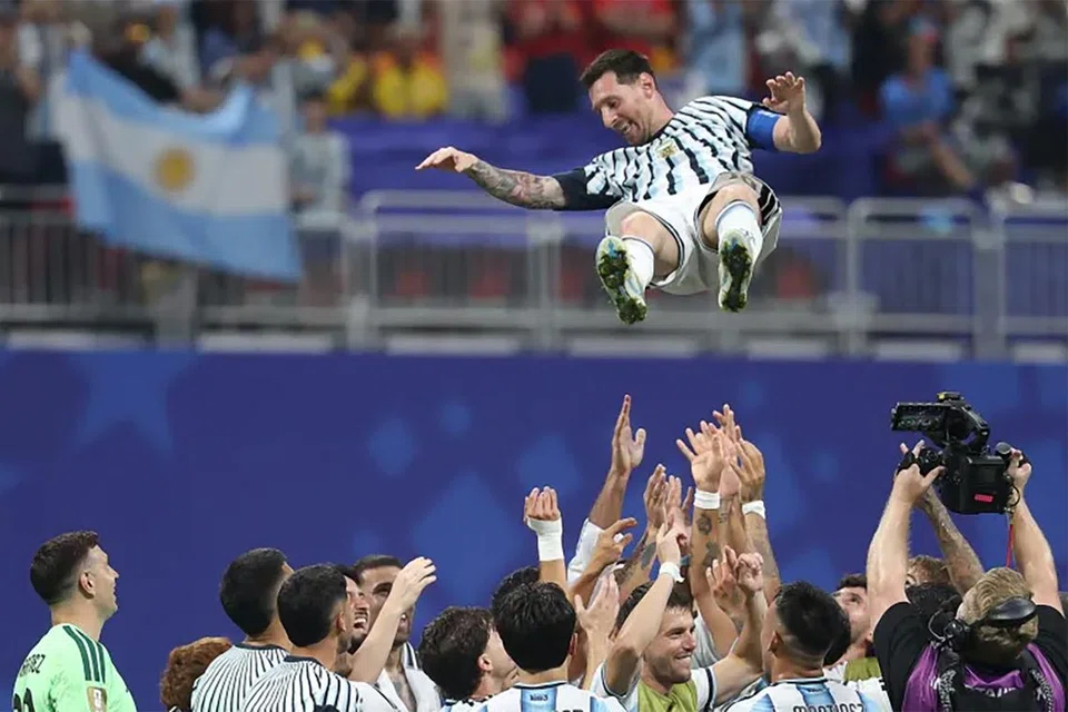 Lionel Messi is lifted by his Argentinian teammates as they celebrate  the  3-2 win over Egypt at the Atlanta Stadium.