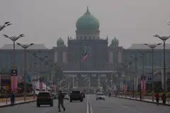 The Malaysia Prime Minister’s office and surrounding buildings are shrouded in haze in Putrajaya, 25 August 2026.