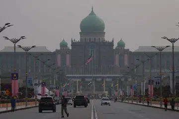 The Malaysia Prime Minister’s office and surrounding buildings are shrouded in haze in Putrajaya, 25 August 2026.