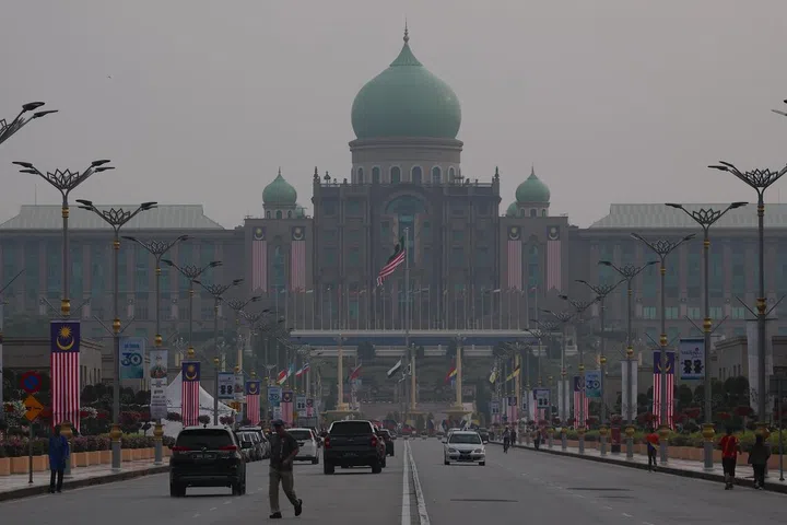 The Malaysia Prime Minister’s office and surrounding buildings are shrouded in haze in Putrajaya, 25 August 2026.