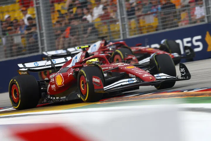 Ferrari's Lewis Hamilton during a practice lap on Oct 4, 2025 on the Marina Bay Street Circuit for the Singapore Grand Prix.