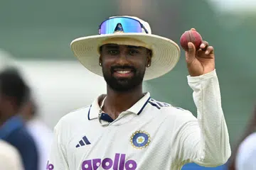 Manav Suthar showing the ball on August 19 after taking six wickets against Sri Lanka.