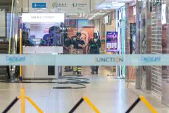 SCDF and SPF officers seen in a sealed off area inside Junction 8