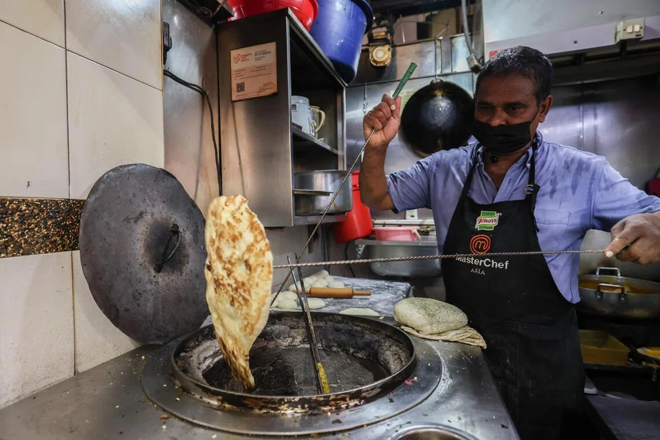 A pillowy naan being made at Delhi Lahori.
