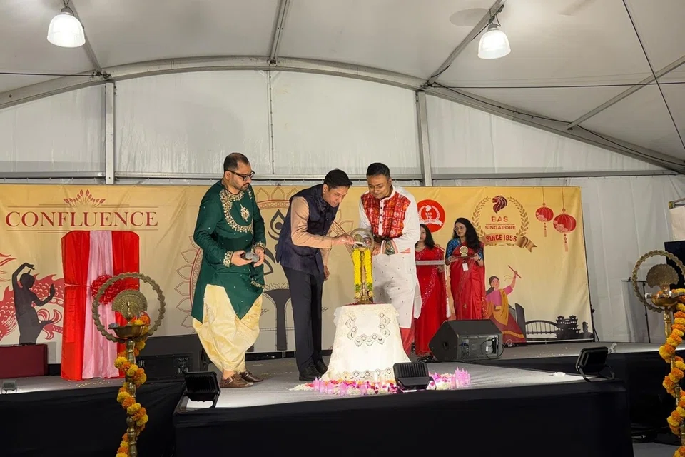 Minister of State Dinesh Vasu Dash inaugurating the Bengali Asoociation Singapore’s (BAS) Durga Puja celebrations, with BAS president Debananda Ghosh (right) on stage.