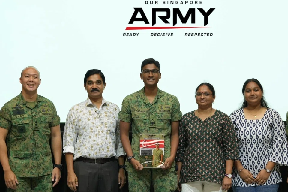 Sai with his family and Army staff