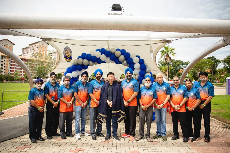 Minister Chee Hong Tat with members of the Pardesi Khalsa Dharmak Diwan Committee at Bishan Active Park on May 17.
