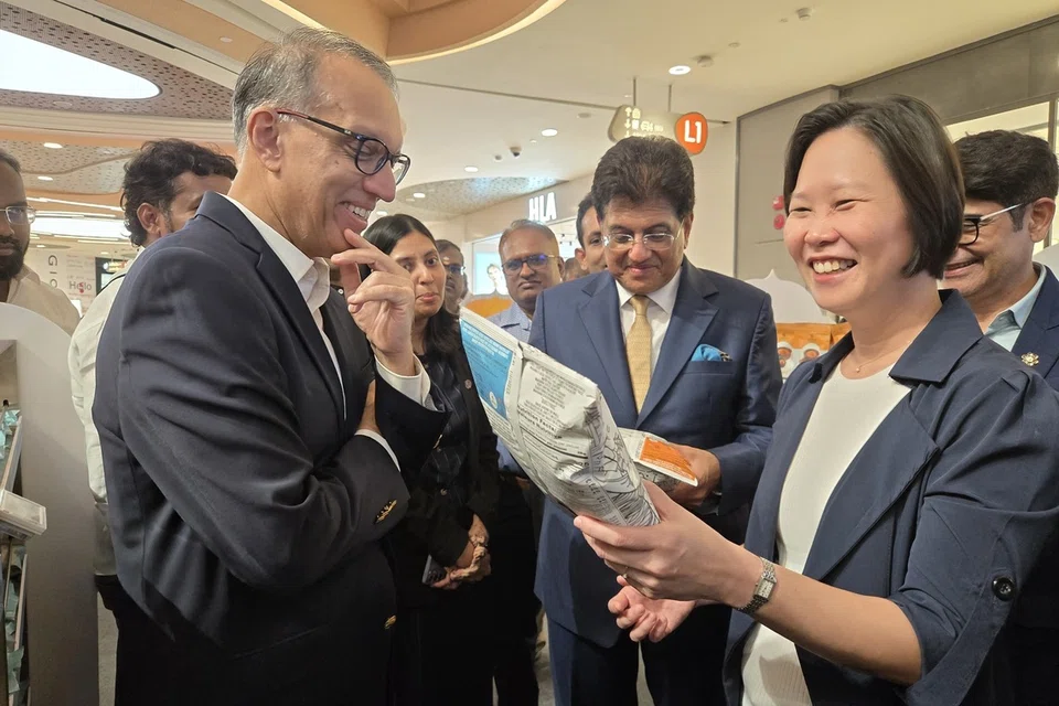 Minister of State for Trade and Industry Gan Siow Huang and India’s Minister of Commerce and Industry Piyush Goyal with Group CEO of Fairprice Group Vipul Chawla at the Indian Food Roadshow at City Square Mall on August 20.