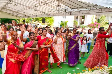 Indian domestic helpers dancing to a Bollywood number at the gathering.