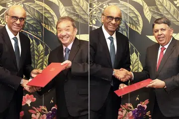 Sitoh Yih Pin (second from left) and Patrick Daniel (right) receiving their letters of credence from President Tharman Shanmugaratnam.
