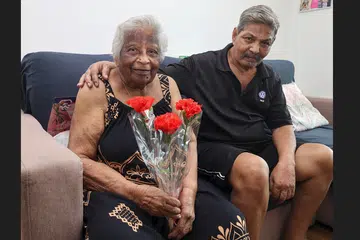 Madam Magdalene Rodrigues and son Christopher.