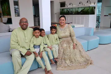 Mr Mimrah Mahmood and wife Rafidah Jalil with their children, including the twins.