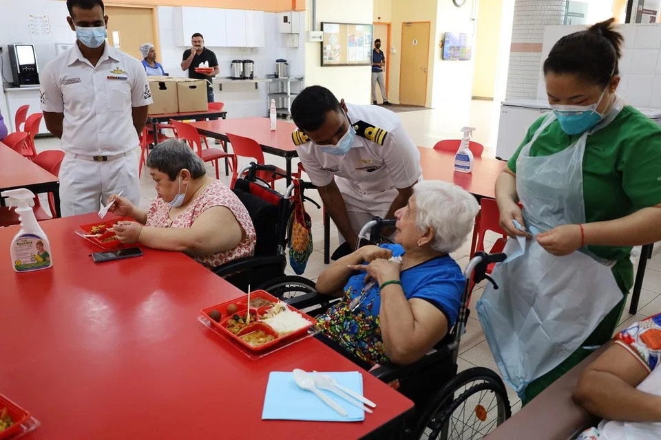 Officers from Indian Navy’s Training Squadron No. 1 interacting with SNM’s Residents’ Committee