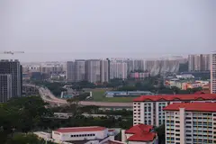 Haze conditions improve in the western part of Singapore, with clearer skies over Jurong East on Oct 22, 2026, as the PSI stands at 94 and the 1hour PM2.5 reading at 46.