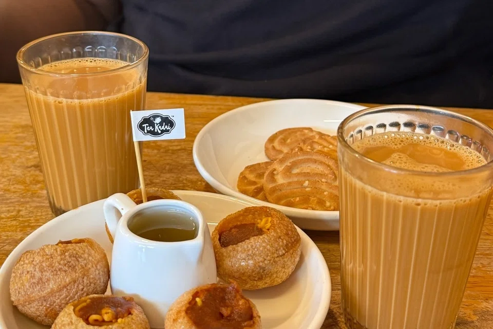 Cups of hot chai, pani puri and cashew cookies at Tea Kadai in Penang’s Little India.