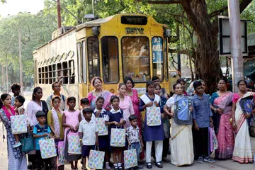 Students and senior citizens before they took the heritage tram on World Thalassemia Day in Kolkata.