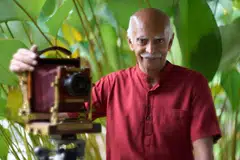 Mr Selva Naidu with his mahogany field camera.                             
