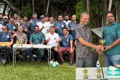 (Left) Porto Novo Association event attendees (Right) Porto Novo Association (Singapore) president Mustafa Kamal (left) presenting a memento to guest of honour Mohan Kumar.