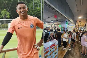 Customers turned up in droves at Lions goalkeeper Hassan Sunny’s food stall in Tampines on June 12.