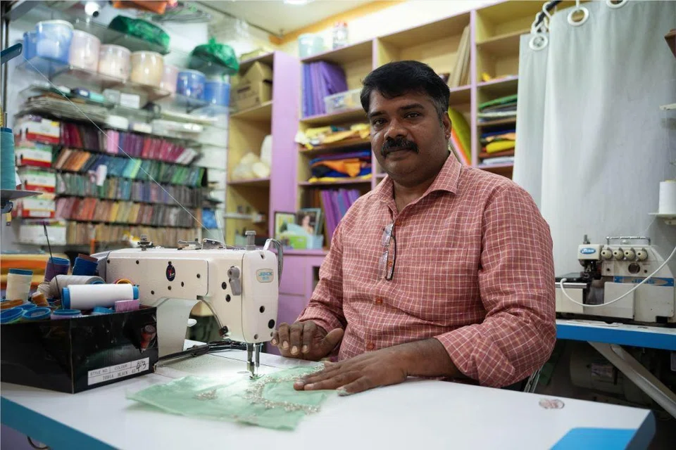 Tailor Antony Raj at his shop at Tekka Centre.