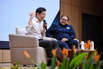 Prime Minister Lawrence Wong and The Straits Times’ associate editor Zakir Hussain at a dialogue with the Singapore Press Club in Toa Payoh on June 8.