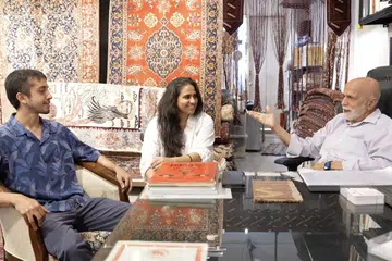 The family in a discussion – (from left) Mr Shezad Hassan, Ms Dania Hassan and Mr Suliman Hamid.